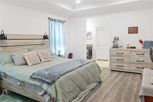 4308 Lago Vista Dr, Sebastian, FL 32976 - bedroom featuring wood finished floors, crown molding, a raised ceiling, and recessed lighting