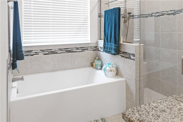 4308 Lago Vista Dr, Sebastian, FL 32976 - bathroom with a stall shower and a garden tub