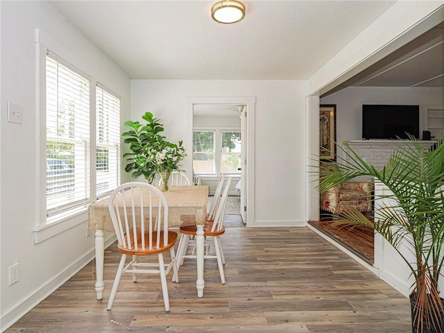 2047 38th Ave, Vero Beach, FL 32960 - dining space with wood finished floors and baseboards