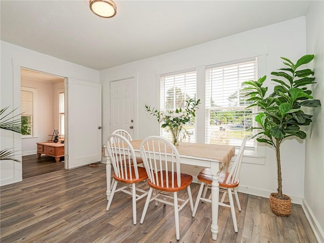 2047 38th Ave, Vero Beach, FL 32960 - dining area with dark wood finished floors and healthy amount of natural light