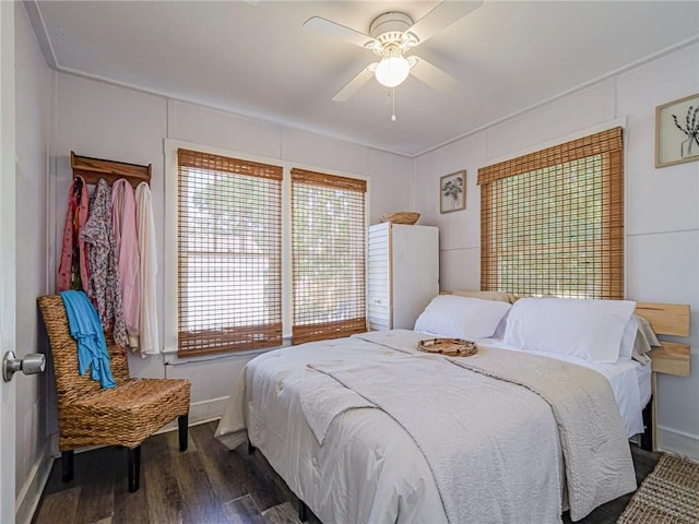 2047 38th Ave, Vero Beach, FL 32960 - bedroom featuring dark wood-style floors and ceiling fan