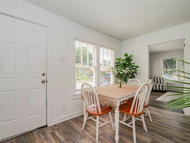 2047 38th Ave, Vero Beach, FL 32960 - dining area featuring wood finished floors and baseboards