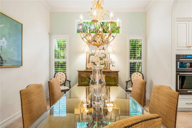 dining room featuring light tile patterned flooring, a notable chandelier, and ornamental molding