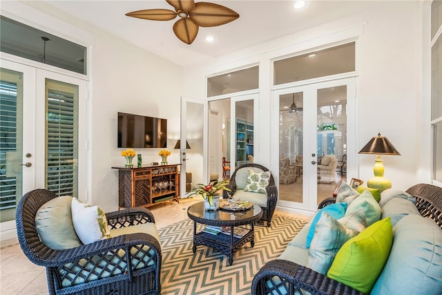 sunroom with french doors and ceiling fan