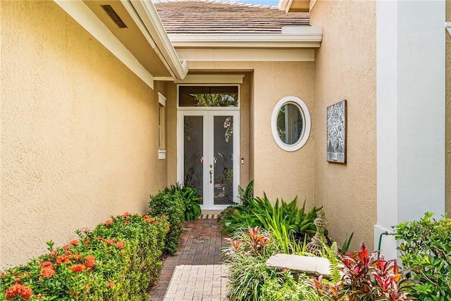1217 Riverwind Cir, Vero Beach, FL 32967 - entrance to property featuring french doors and stucco siding