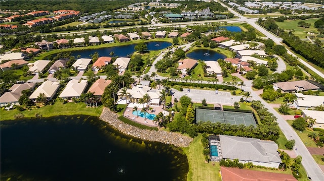 bird's eye view with a water view