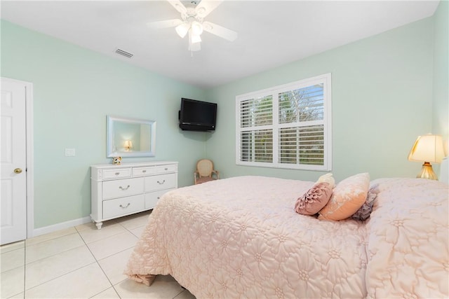 bedroom featuring light tile patterned flooring and ceiling fan