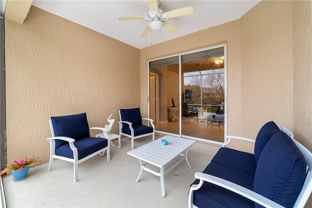 view of patio / terrace featuring ceiling fan and outdoor lounge area