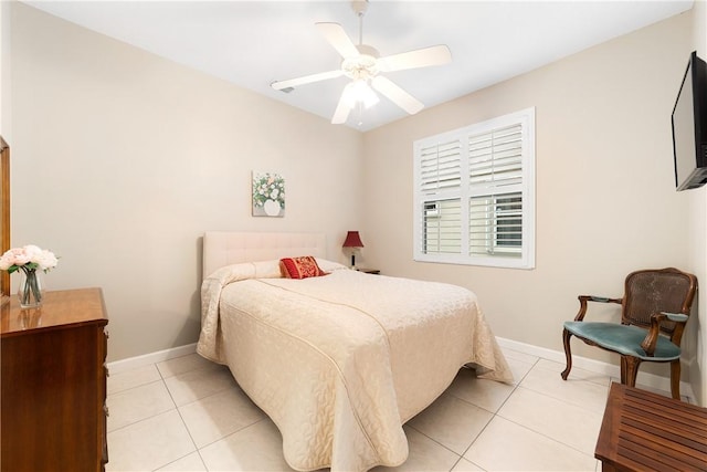 tiled bedroom with ceiling fan