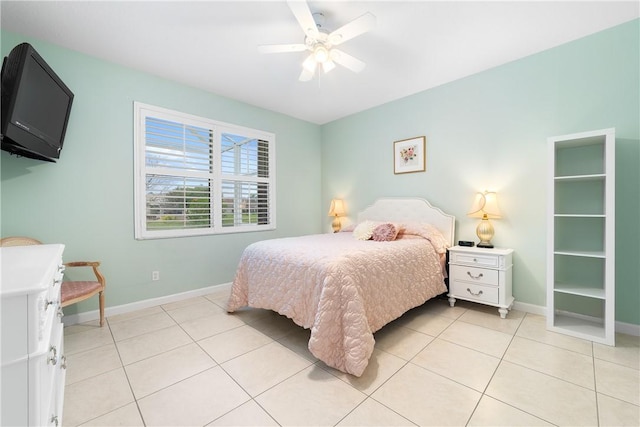 bedroom with ceiling fan and light tile patterned floors