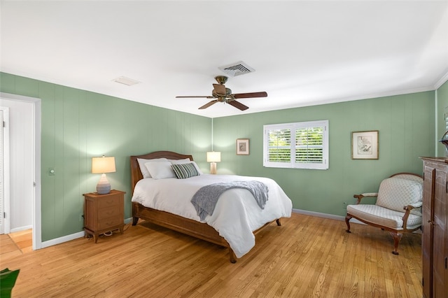 bedroom featuring ceiling fan and light hardwood / wood-style flooring