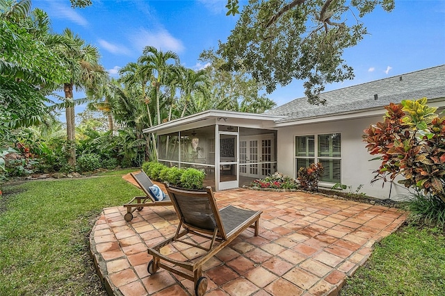 view of patio featuring a sunroom