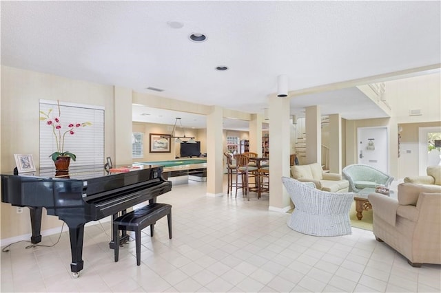 miscellaneous room with light tile patterned floors and pool table