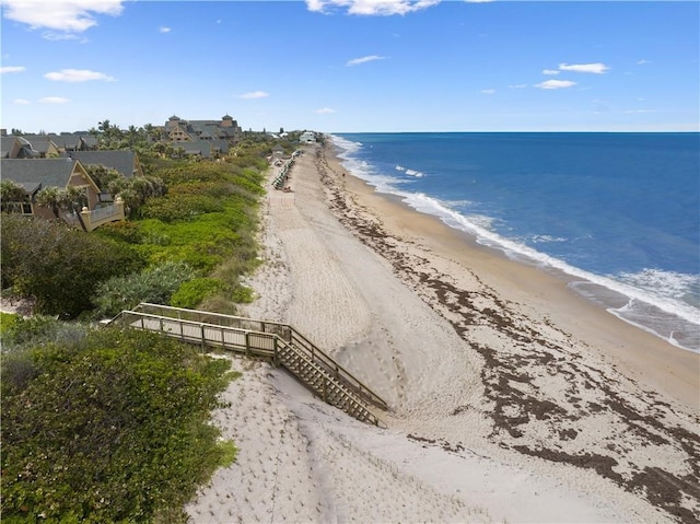 property view of water featuring a beach view