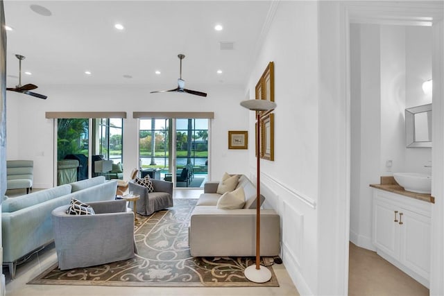1242 River Reach Dr, Vero Beach, FL 32967 - living room with a ceiling fan and recessed lighting