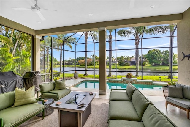 1242 River Reach Dr, Vero Beach, FL 32967 - sunroom / solarium with an outdoor living space with a fire pit, a water view, and ceiling fan