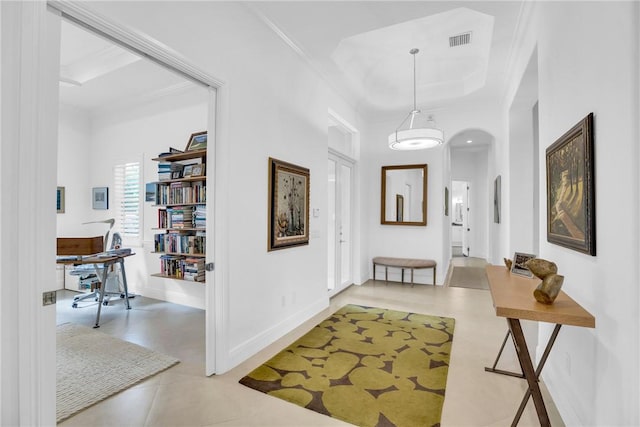 1242 River Reach Dr, Vero Beach, FL 32967 - corridor with a desk, ornamental molding, and arched walkways