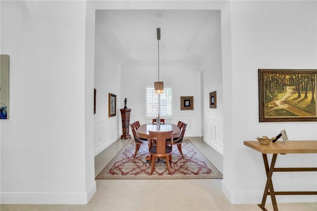 1242 River Reach Dr, Vero Beach, FL 32967 - dining room featuring a decorative wall