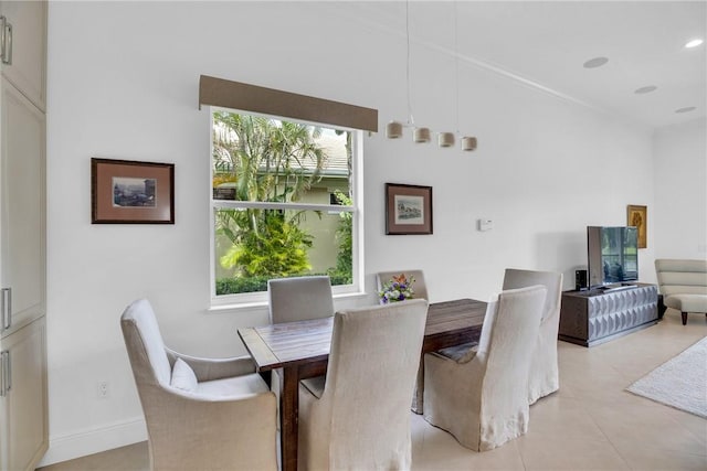 1242 River Reach Dr, Vero Beach, FL 32967 - dining area with plenty of natural light and light tile patterned flooring