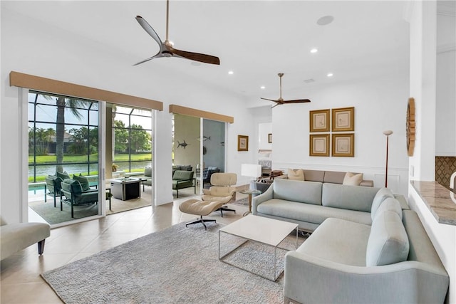 1242 River Reach Dr, Vero Beach, FL 32967 - tiled living room with a ceiling fan and recessed lighting