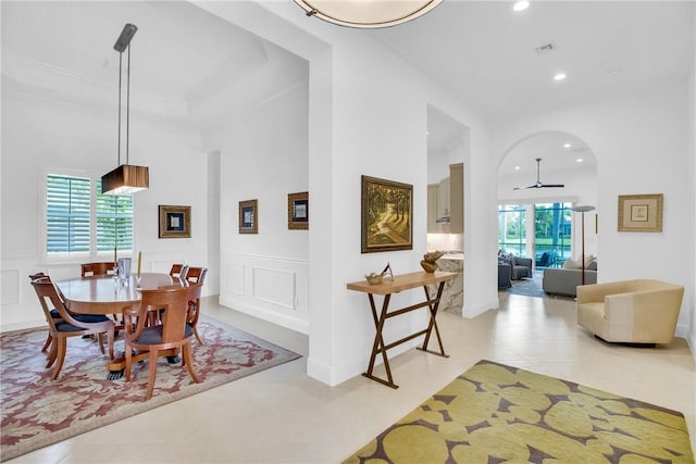 1242 River Reach Dr, Vero Beach, FL 32967 - dining space featuring healthy amount of natural light, recessed lighting, a decorative wall, and a wainscoted wall