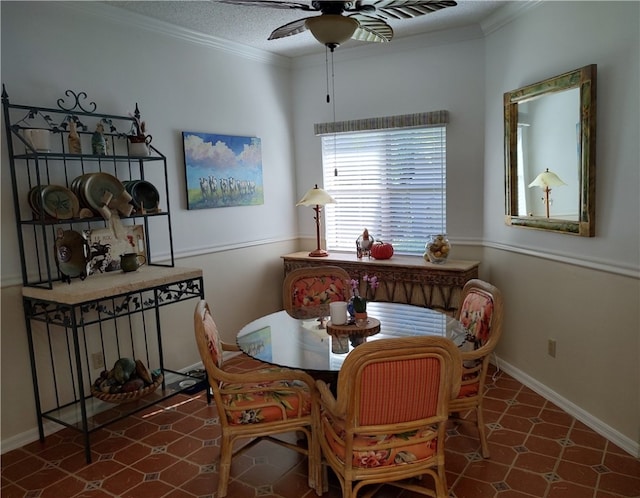 dining space with a textured ceiling, ceiling fan, and ornamental molding