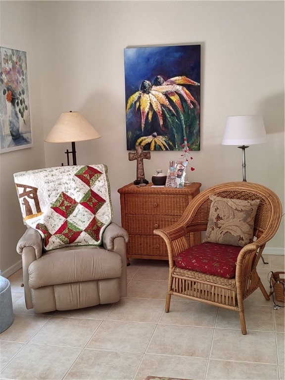 sitting room with light tile patterned floors