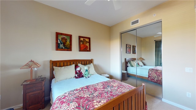 bedroom featuring a closet, carpet flooring, and ceiling fan