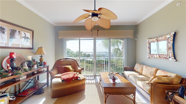 living room featuring tile patterned flooring, ceiling fan, and crown molding