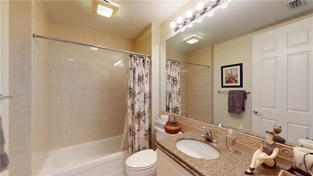 full bathroom with vanity, a textured ceiling, toilet, and shower / bathtub combination with curtain