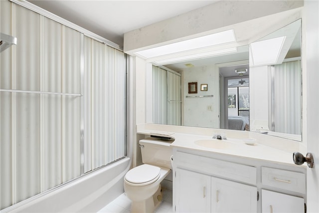 full bathroom featuring tile patterned floors, vanity, ceiling fan, enclosed tub / shower combo, and toilet