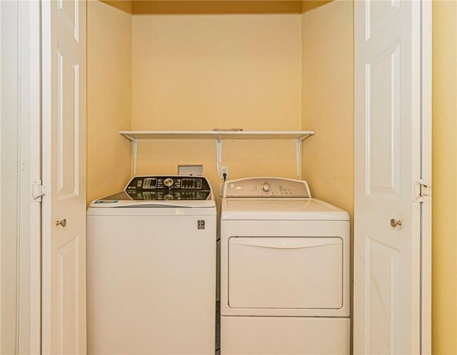 laundry area featuring washing machine and dryer