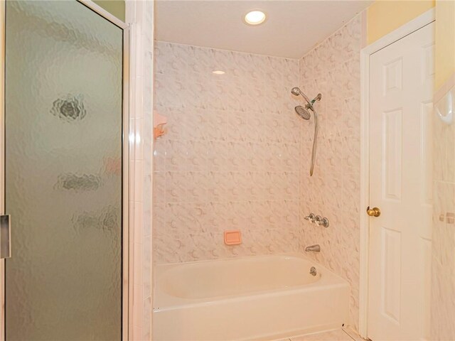 bathroom with separate shower and tub