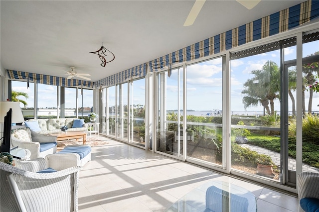 sunroom featuring plenty of natural light and ceiling fan