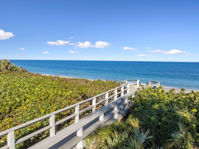 view of water feature with a beach view