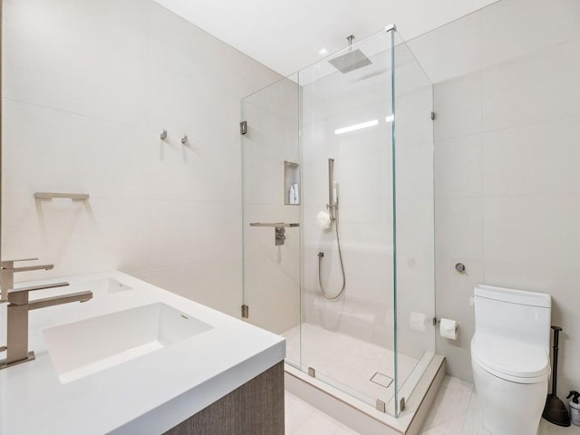 111 Mariner Beach Ln, Vero Beach, FL 32963 - full bath featuring a shower stall, double vanity, and tile walls