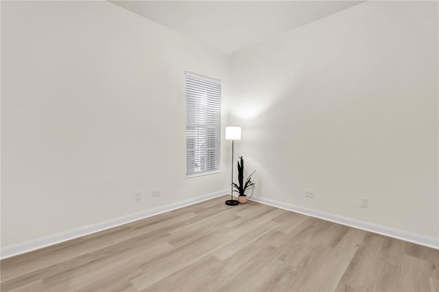 unfurnished room with light hardwood / wood-style flooring