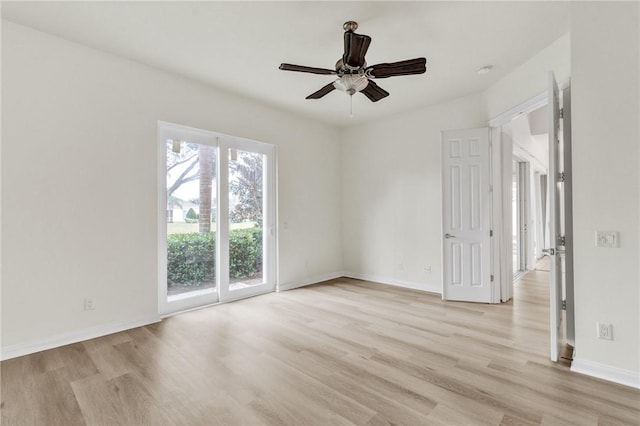 unfurnished room featuring light wood-type flooring and ceiling fan