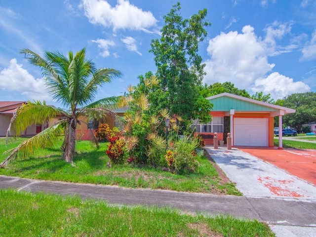 663 20th Pl SW, Vero Beach, FL 32962 - view of front of property with a garage and concrete driveway