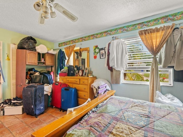 663 20th Pl SW, Vero Beach, FL 32962 - bedroom featuring a textured ceiling and a ceiling fan