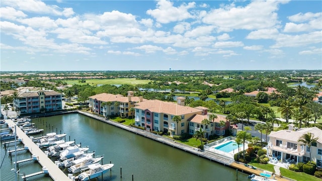 bird's eye view featuring a residential view and a water view