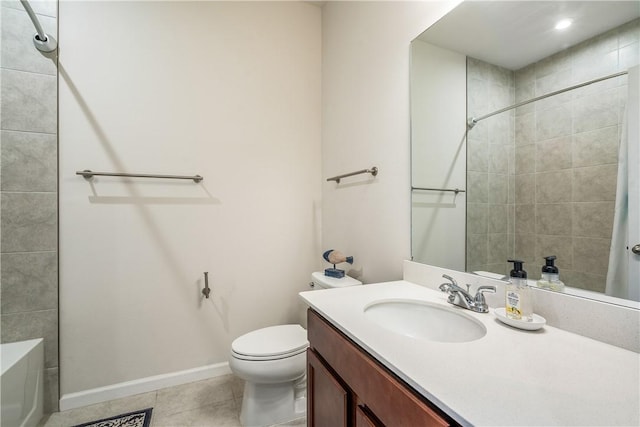 bathroom with tile patterned floors, vanity, and toilet