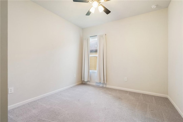 unfurnished room with light carpet, ceiling fan, and baseboards