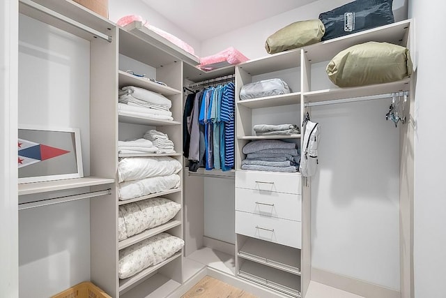 walk in closet featuring light wood-type flooring