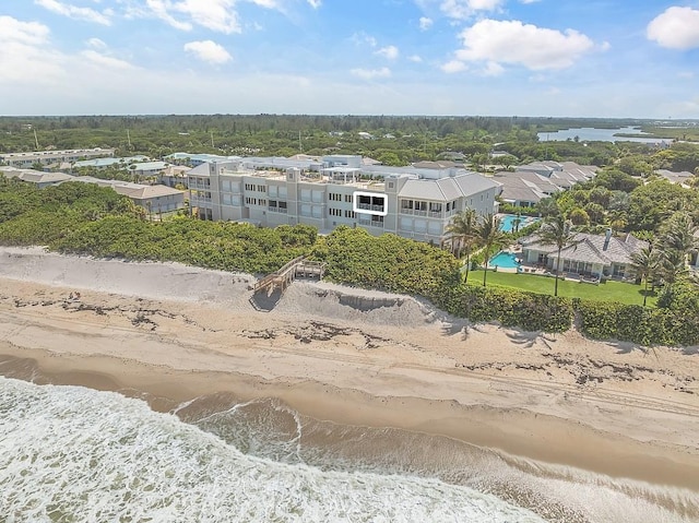 aerial view with a view of the beach and a water view