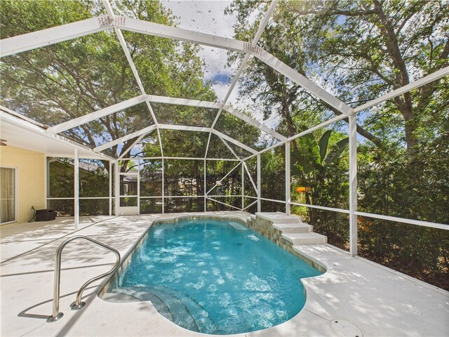 1458 Stonecrop St, Sebastian, FL 32958 - pool featuring glass enclosure and a patio area