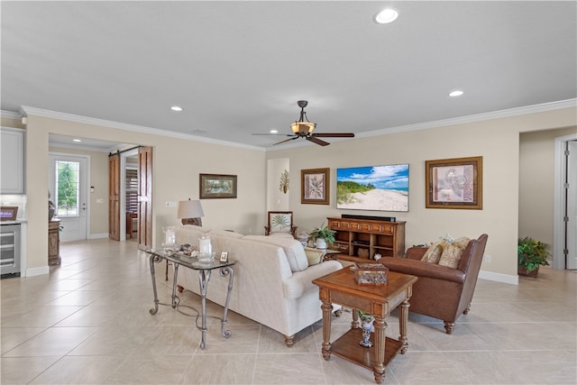 living room featuring ceiling fan, light tile patterned floors, and crown molding