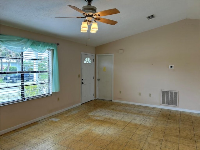 1080 Seamist Ln, Sebastian, FL 32958 - entrance foyer with vaulted ceiling, visible vents, and a ceiling fan