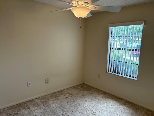 1080 Seamist Ln, Sebastian, FL 32958 - spare room featuring baseboards, carpet flooring, and ceiling fan