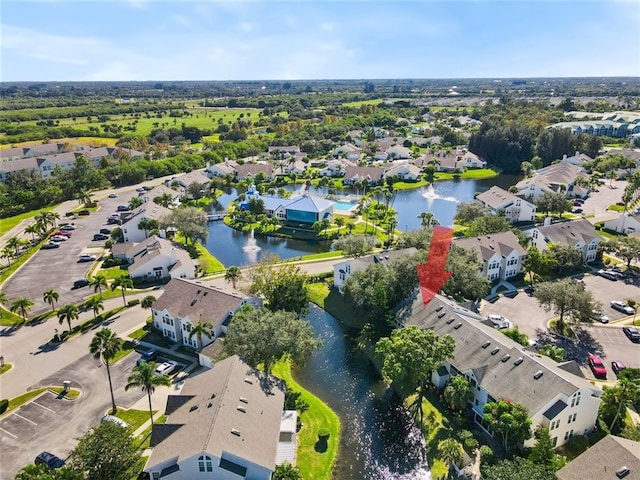 aerial view with a residential view and a water view